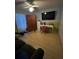 Functional bedroom space featuring a desk, closet, and comfortable seating area at 3063 Ash Park Loop, Winter Park, FL 32792