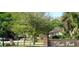 Hyde Park community entrance sign with mature trees and landscaping at 3063 Ash Park Loop, Winter Park, FL 32792