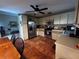 Modern kitchen with stainless steel appliances, ample cabinet space, and a tile floor at 3063 Ash Park Loop, Winter Park, FL 32792