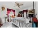 Comfortable bedroom with bright natural light, a ceiling fan, and cozy decor at 314 Avalone Dr, Apopka, FL 32703