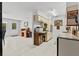 Open kitchen featuring ample cabinet space, microwave and a convenient breakfast bar at 314 Avalone Dr, Apopka, FL 32703