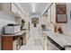 Functional kitchen with plenty of cabinet space and tiled countertop at 314 Avalone Dr, Apopka, FL 32703