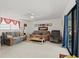 Cozy living room with comfortable sofas and sliding glass door access to the patio at 314 Avalone Dr, Apopka, FL 32703