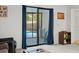 The living room has access to the pool area through sliding glass doors at 314 Avalone Dr, Apopka, FL 32703