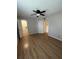 Bedroom with hardwood floors, neutral walls, and ample closet space at 315 Lakepointe Dr # 201, Altamonte Springs, FL 32701