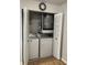 Convenient laundry closet complete with washer, dryer, and water heater, maximizing space at 315 Lakepointe Dr # 201, Altamonte Springs, FL 32701