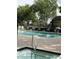 Resort style pool with hot tub and plenty of poolside seating with nearby residences at 315 Lakepointe Dr # 201, Altamonte Springs, FL 32701