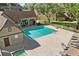 Aerial of the community pool with tanning deck and adjacent buildings at 325 Lakepointe Dr # 303, Altamonte Springs, FL 32701
