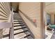 View of the staircase leading to the unit's entrance at 325 Lakepointe Dr # 303, Altamonte Springs, FL 32701