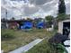 Backyard showing clutter and untidy surroundings at 330 S Buena Vista Ave, Orlando, FL 32835