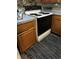 The kitchen features an electric range and cooktop, with surrounding wooden cabinets at 330 S Buena Vista Ave, Orlando, FL 32835