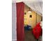 This room has neutral paint, unique decorative curtains, and minimal lighting fixtures at 330 S Buena Vista Ave, Orlando, FL 32835