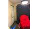 The room features textured walls and outdated fixtures, with limited natural light at 330 S Buena Vista Ave, Orlando, FL 32835