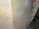Interior wall showing stains and patching at 330 S Buena Vista Ave, Orlando, FL 32835
