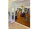 Open living room with hardwood floors and elegant furnishings at 335 W Bay St, Winter Garden, FL 34787