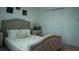 Bedroom with a bed, nightstand and closet at 33891 Sky Blossom Cir, Leesburg, FL 34788