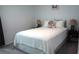Cozy bedroom with a comfortable bed and neutral decor at 33891 Sky Blossom Cir, Leesburg, FL 34788