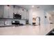 Contemporary kitchen featuring ample counter space, modern appliances, and sleek cabinetry at 33891 Sky Blossom Cir, Leesburg, FL 34788