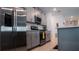 Well-equipped kitchen with stainless steel appliances and a functional layout at 33891 Sky Blossom Cir, Leesburg, FL 34788