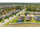 Panoramic view of a home featuring a screened-in pool and fenced yard at 3632 Gretchen Dr, Ocoee, FL 34761