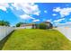 A spacious backyard features a privacy fence and a screened-in pool enclosure at 3632 Gretchen Dr, Ocoee, FL 34761