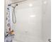 Well-maintained bathroom with a white tiled shower/tub combo and fun shower curtain at 3632 Gretchen Dr, Ocoee, FL 34761