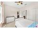 Inviting bedroom with a ceiling fan and views into the hallway and ensuite bathroom at 3632 Gretchen Dr, Ocoee, FL 34761