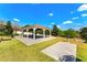 Outdoor gazebo with picnic tables and BBQ grill, perfect for community gatherings at 3632 Gretchen Dr, Ocoee, FL 34761