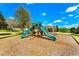 Neighborhood playground with slides and climbing structures, perfect for Gathering fun at 3632 Gretchen Dr, Ocoee, FL 34761