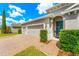 Charming single-story home with a 3-car garage, brick paver driveway and manicured landscaping at 3632 Gretchen Dr, Ocoee, FL 34761
