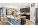 Stylish kitchen with granite countertops, stainless steel appliances, and a spacious center island at 3632 Gretchen Dr, Ocoee, FL 34761