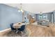 Open-concept living and dining area with stylish furnishings and plenty of natural light at 3632 Gretchen Dr, Ocoee, FL 34761