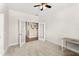 Cozy office space with double doors, neutral carpet, and a modern desk at 3632 Gretchen Dr, Ocoee, FL 34761