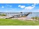 Expansive backyard featuring a private dock and lake access at 3640 Crump Rd, Winter Haven, FL 33881