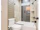 Updated bathroom featuring a tub and shower combo with decorative tile at 3640 Crump Rd, Winter Haven, FL 33881