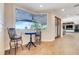 Bright breakfast nook featuring a bay window overlooking the water at 3640 Crump Rd, Winter Haven, FL 33881