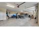 Spacious garage featuring tile floors, storage, and parking for a boat, jetski and a truck at 3640 Crump Rd, Winter Haven, FL 33881
