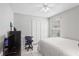 Bedroom featuring tile flooring, a ceiling fan, and closet at 3830 Spring Breeze Dr, Orlando, FL 32829