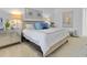 The main bedroom is decorated in neutral colors with stylish furnishings and lots of light at 4569 Cabello Loop, Kissimmee, FL 34746