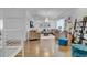 Bright and spacious living room with hardwood floors, stylish furnishings, and ample natural light at 4569 Cabello Loop, Kissimmee, FL 34746