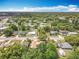 Aerial view of the neighborhood highlighting the mature trees, manicured lawns, and community pool at 4887 Seminole Ave, Winter Park, FL 32792