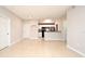The living room leading into the kitchen at 5578 Metrowest Blvd # 10, Orlando, FL 32811