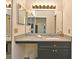 Bright bathroom featuring a granite vanity with plenty of counter space and storage at 615 Clemson Dr, Altamonte Springs, FL 32714