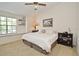 Well-lit bedroom with a plush bed, ample natural light, and modern furnishings at 615 Clemson Dr, Altamonte Springs, FL 32714