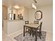 Dining area with modern lighting, open to the kitchen for easy serving and entertaining at 615 Clemson Dr, Altamonte Springs, FL 32714