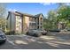 Apartment complex with parking, featuring balconies and a well-maintained exterior, set against a blue sky at 623 Dory Ln # 307, Altamonte Springs, FL 32714