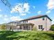 Expansive lawn with a screened pool and patio, perfect for enjoying the outdoors at 645 American Holly Pl, Oviedo, FL 32765