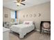 Bedroom featuring neutral walls, ceiling fan and a bed at 645 American Holly Pl, Oviedo, FL 32765