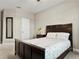 Bedroom featuring neutral walls, ceiling fan and a bed at 645 American Holly Pl, Oviedo, FL 32765