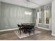 Cozy game room featuring a round game table and neutral-toned decor at 645 American Holly Pl, Oviedo, FL 32765